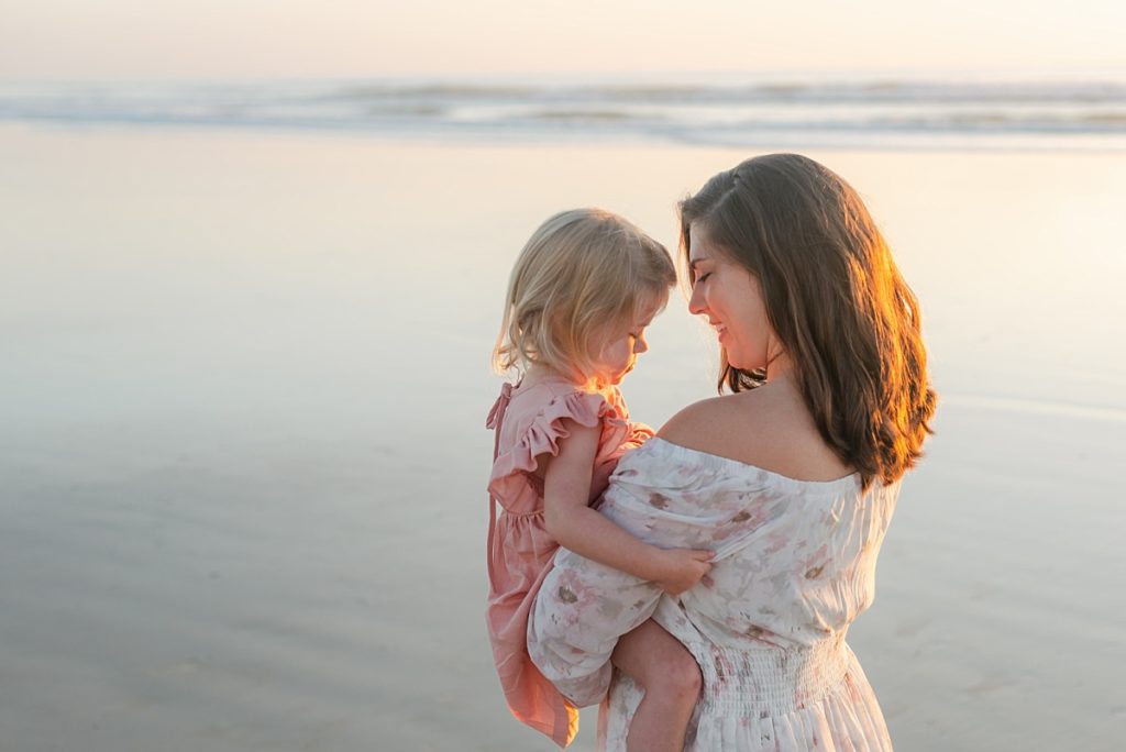 Mom and baby on the beach